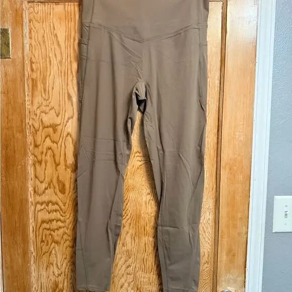 Halara Slimming Women’s Dawn Brown High Waisted leggings with pockets. - Picture 3 of 8